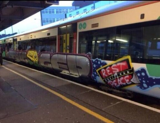 this is graffitied on side of train! Amazing 